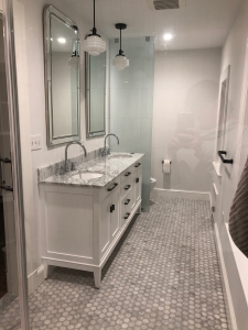 grey bathroom with double sink