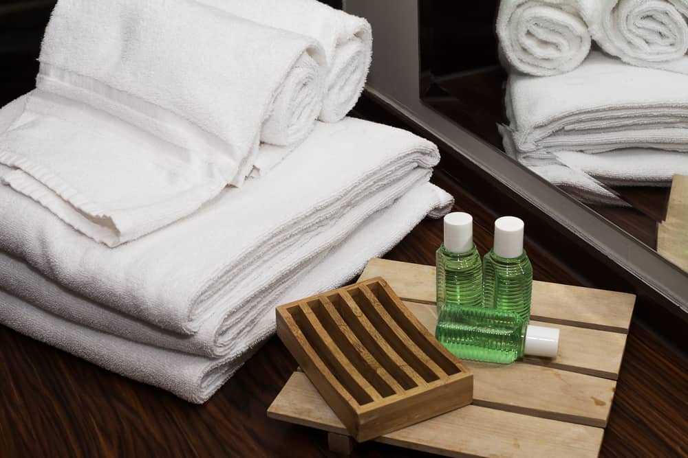 Towels and mini soap in the guest bathroom to make family and friends feel relaxed while using your newly renovated guest bathroom